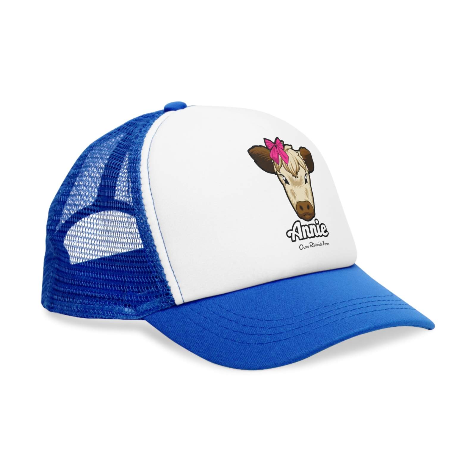 Farmhouse trucker cap with cow design and red bow, blue mesh back.