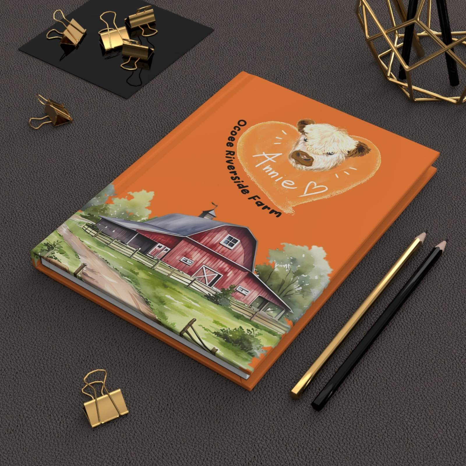 Farm hardcover journal with adorable cow illustration and red barn design on orange matte laminated cover.