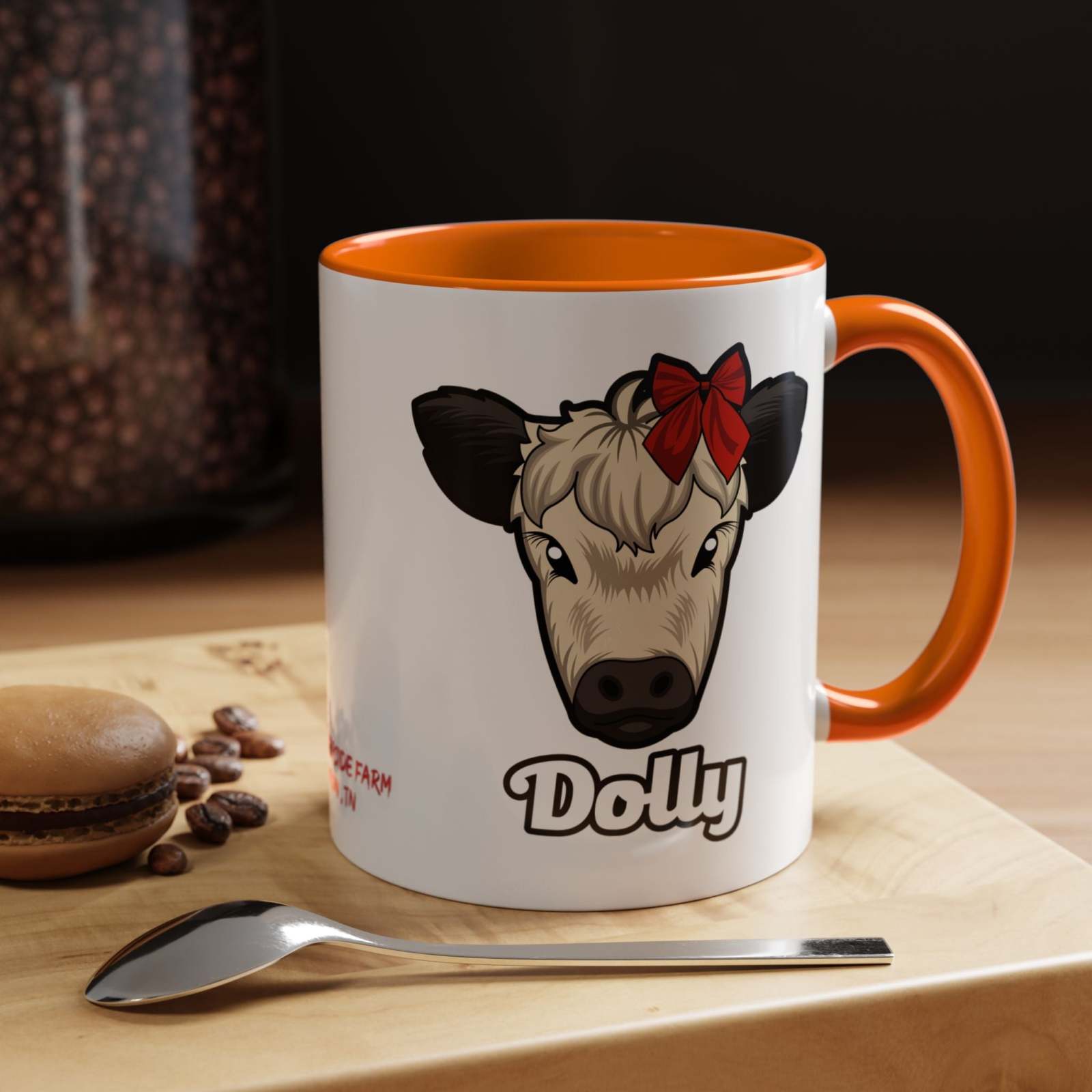 Farm Animal Coffee Mug featuring Dolly the Cute Cow with a Red Bow, ceramic with orange handle and interior, microwave and dishwasher safe.
