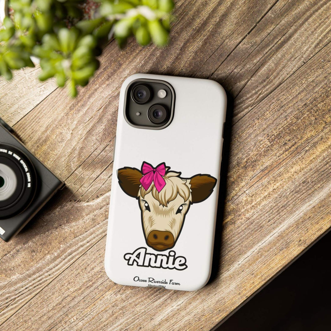 Cute cow phone case with red bow and farmhouse design, perfect farm animal lover gift, durable and stylish by Ocoee Riverside.