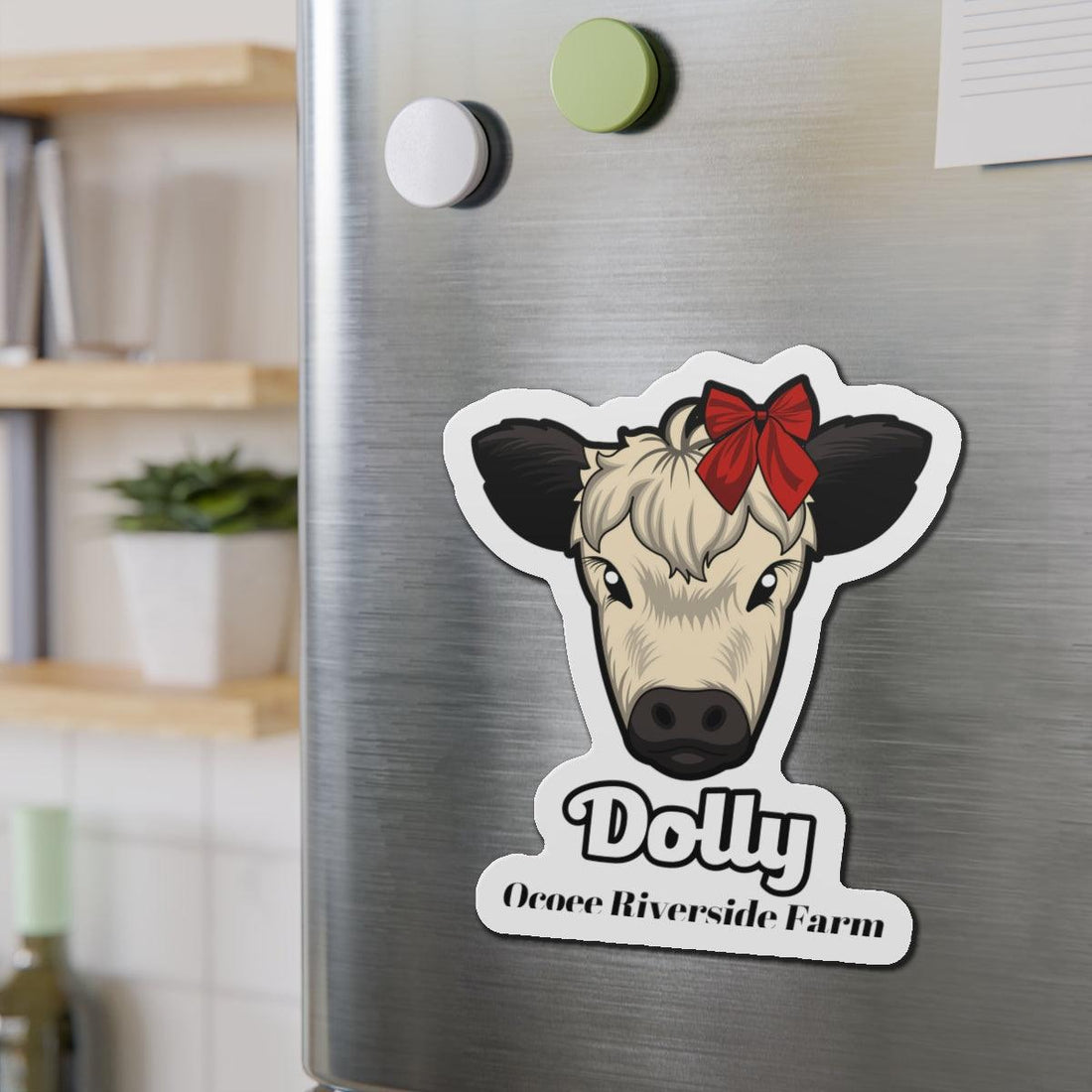 Charming cow die-cut magnet with red bow on stainless steel fridge, farmhouse decor accessory
