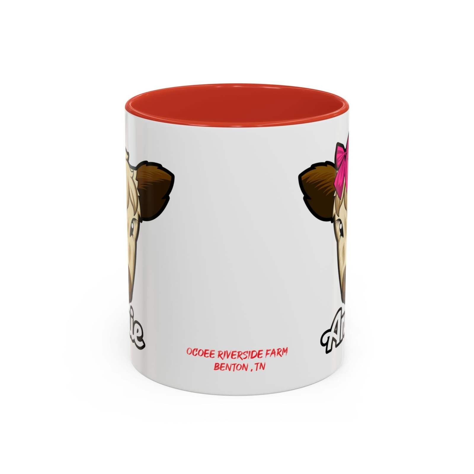 Farmhouse cow coffee mug with red interior and cow print featuring a red bow, perfect for rustic décor.