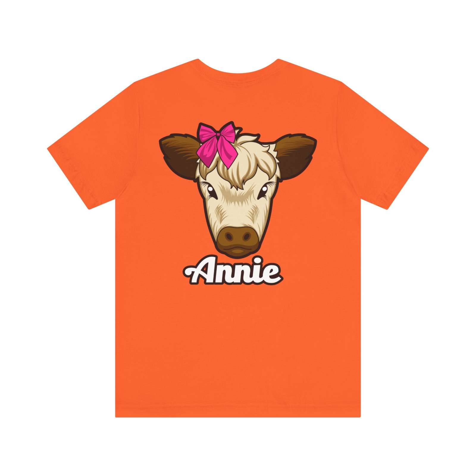Farm Life T-Shirt featuring Annie the Cow with red bow on orange fabric.