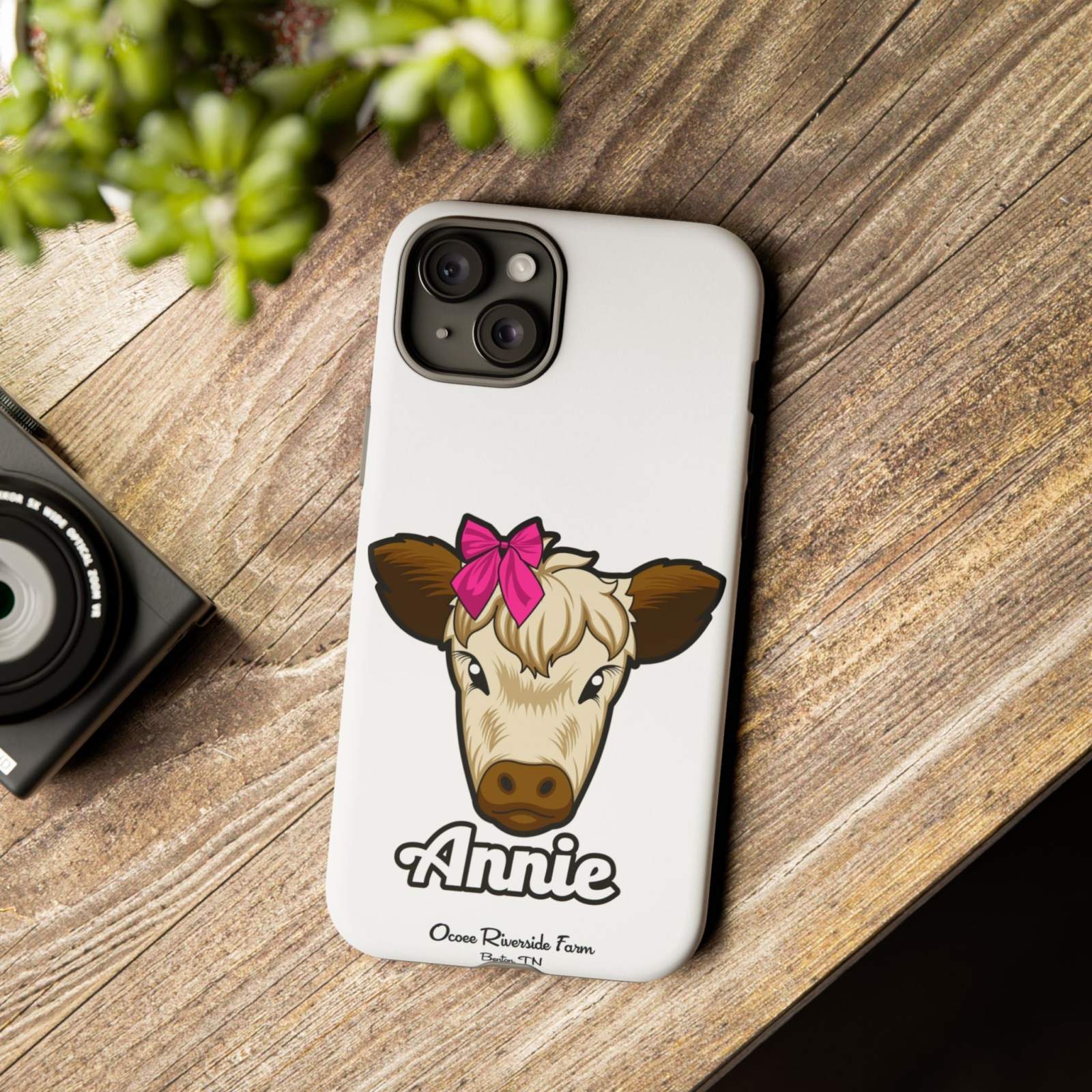 Cute cow phone case with red bow, perfect farm animal lover gift.