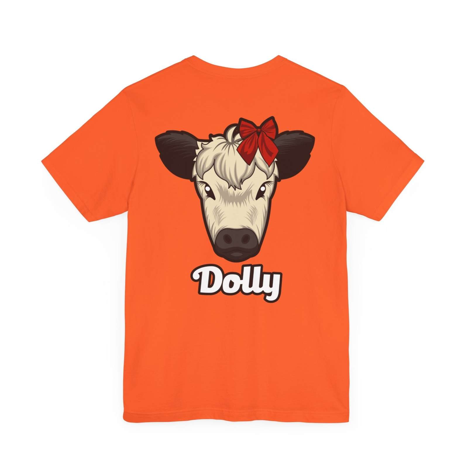 Orange Country Cow Graphic Tee featuring a cow with a red bow and the name Dolly printed on the back