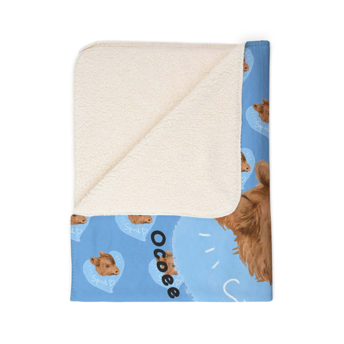 Snuggly Farmhouse Blanket featuring cozy fleece with Spud the Cow design on blue background and soft cream sherpa lining