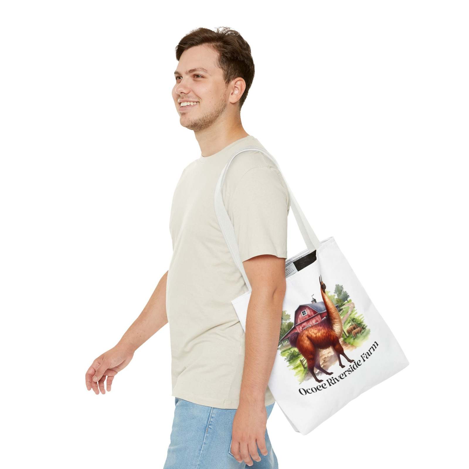 Man carrying eco-friendly Alpaca Tote Bag from Ocoee Riverside Farm with animal and farm design