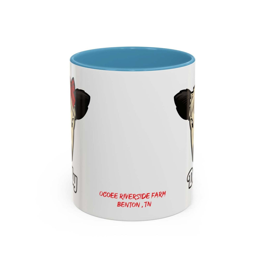 White ceramic farm animal coffee mug featuring Dolly the cute cow with a red bow and blue interior, microwave and dishwasher safe.