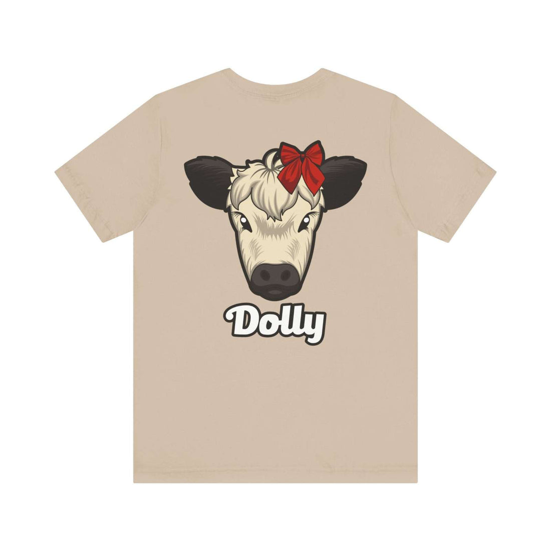 Country Cow Graphic Tee featuring a cow named Dolly with a red bow on a beige soft cotton t-shirt