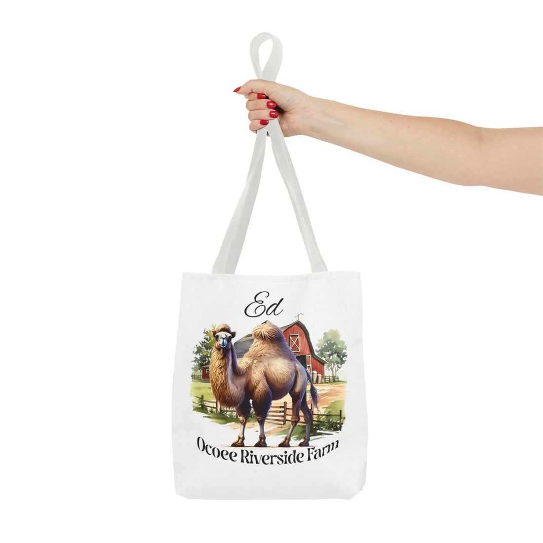 White Ed Camel Tote Bag with Ocoee Riverside Farm camel artwork, eco-friendly shopping bag held by hand