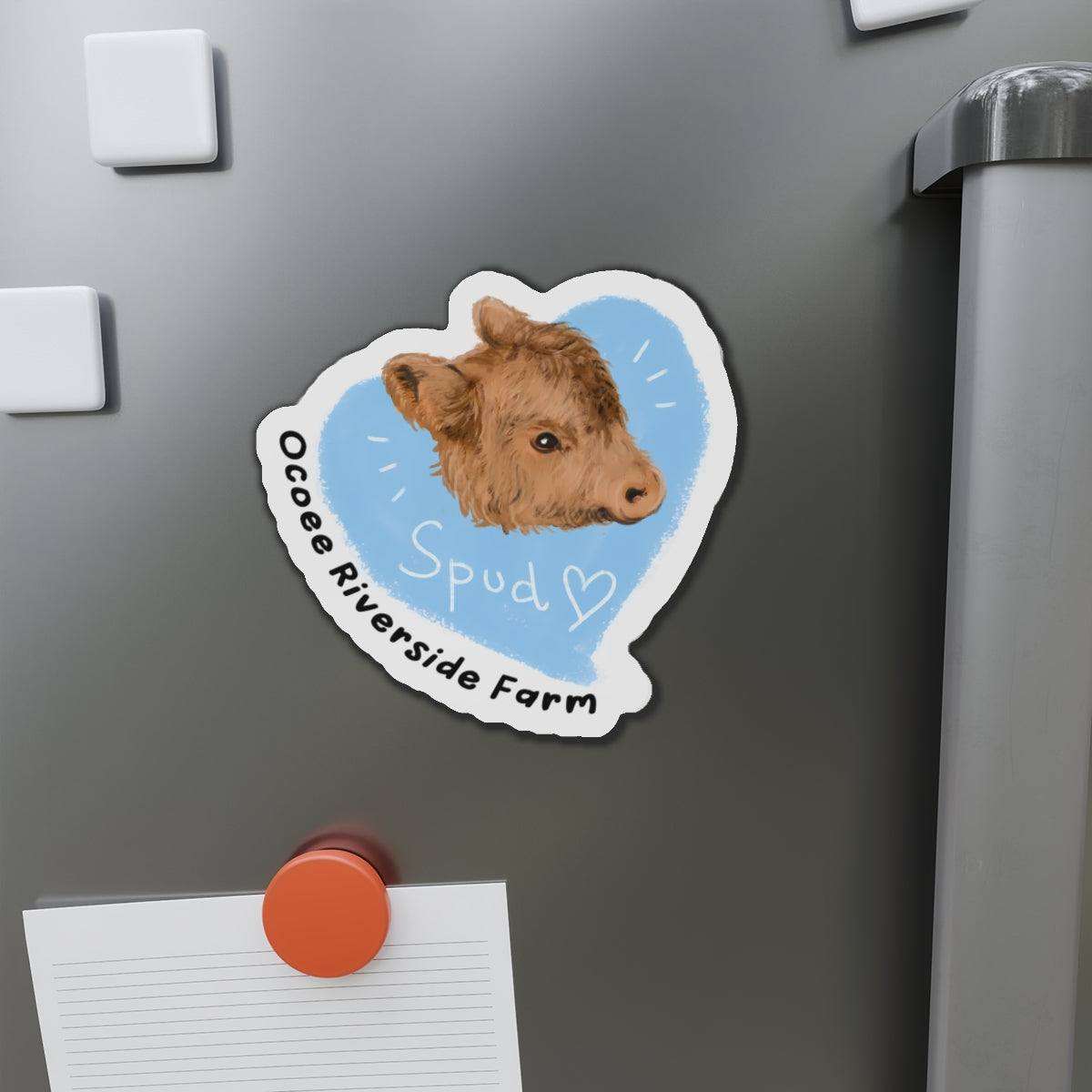Farm Animal Decor Magnet featuring a charming brown cow head illustration with "Spud" and "Ocoee Riverside Farm" text on a refrigerator door