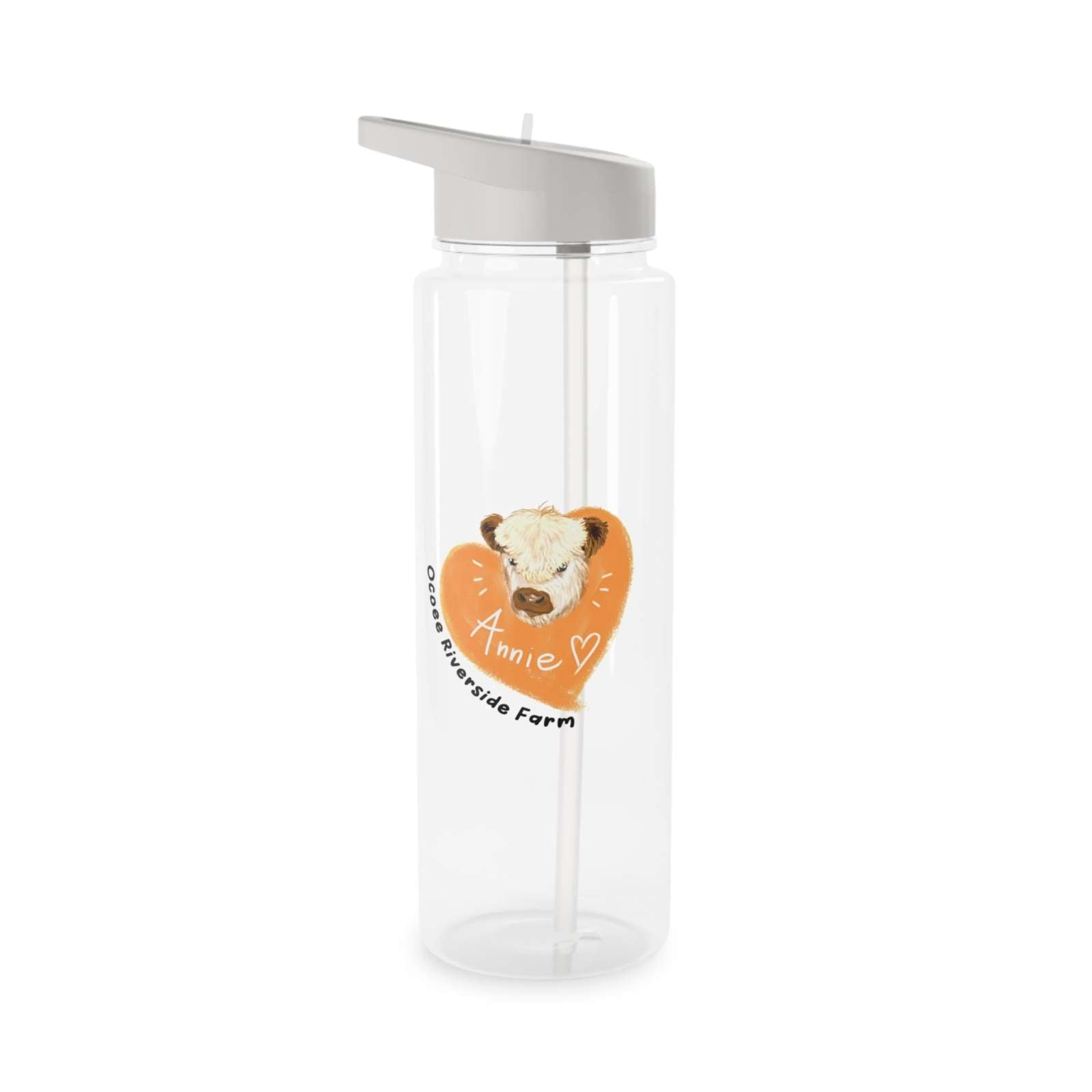 Clear Country Cow Water Bottle with gray spill-resistant lid, foldable straw, and cow illustration labeled "Annie" on orange heart background