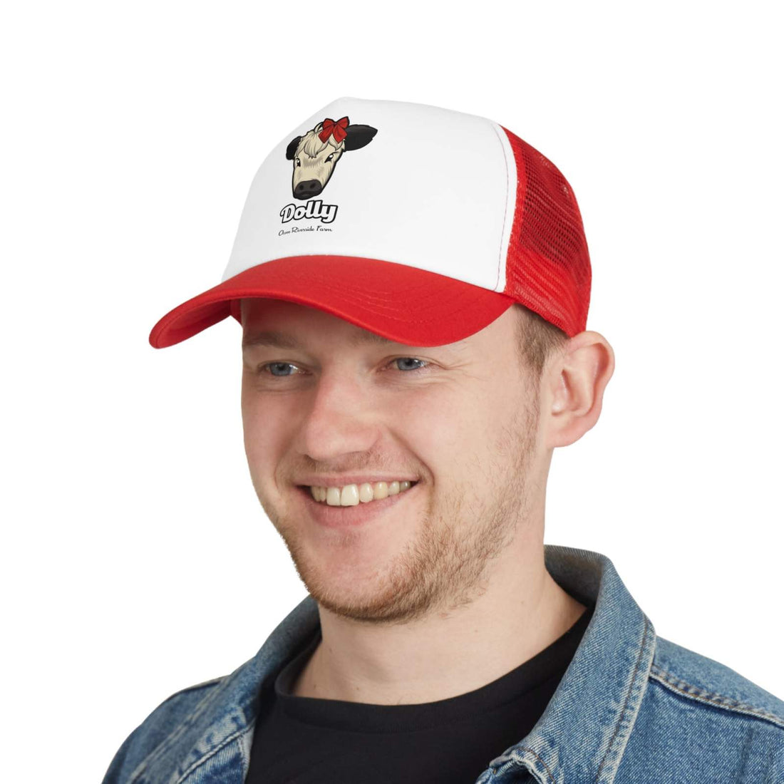 Man wearing a Rustic Farm Trucker Hat with red mesh back and white front featuring Dolly the Adorable Red Bow Cow design