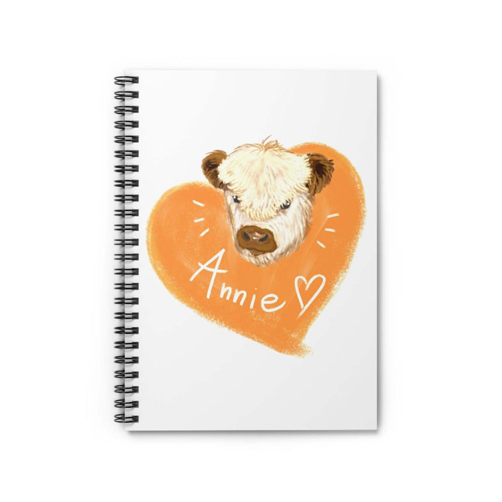 Cute Cow Spiral Notebook with Annie cow illustration and orange heart on white cover