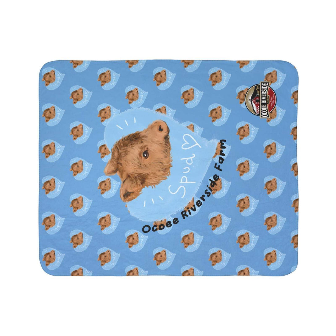 Blue Snuggly Farmhouse Blanket featuring Spud the Cow pattern with cozy fleece material and Ocoee Riverside Farm branding
