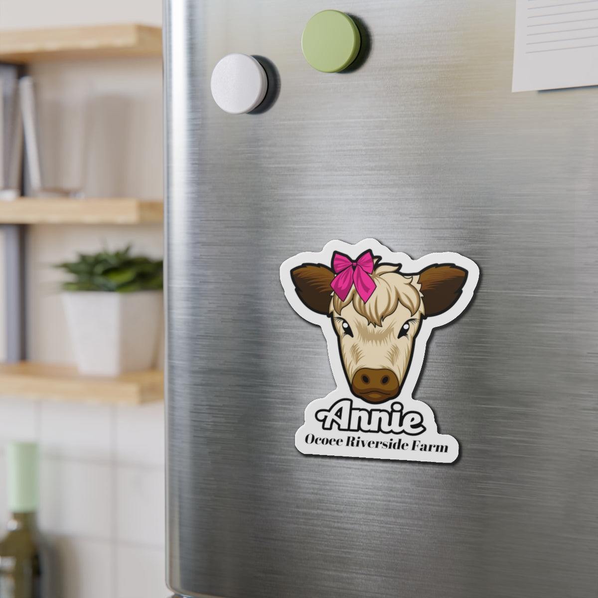 Cow Die-Cut Magnet with cute cow face and pink bow on a refrigerator door, farmhouse decor accessory