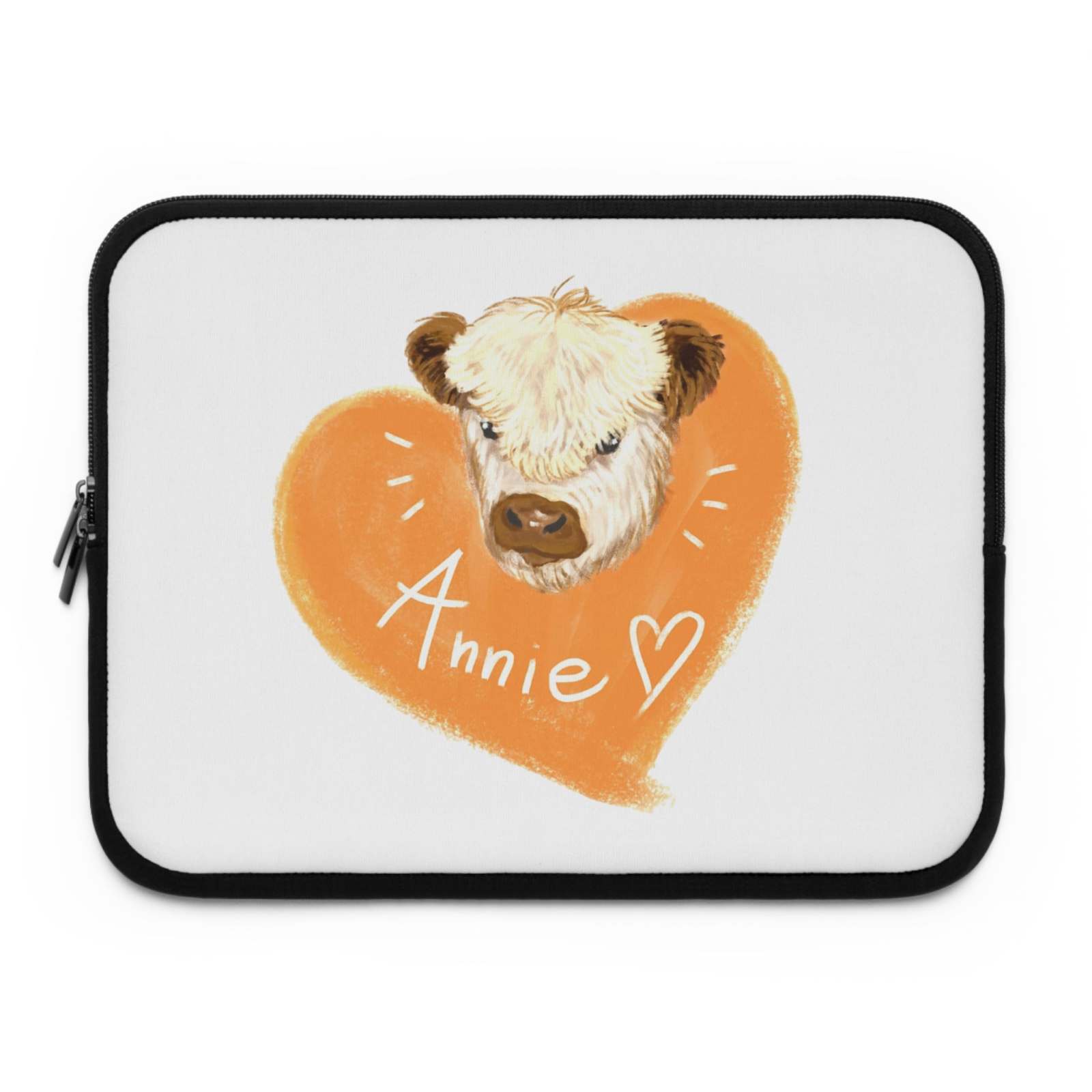 Custom Cow Laptop Sleeve with an orange heart design and personalized name "Annie" for animal lovers