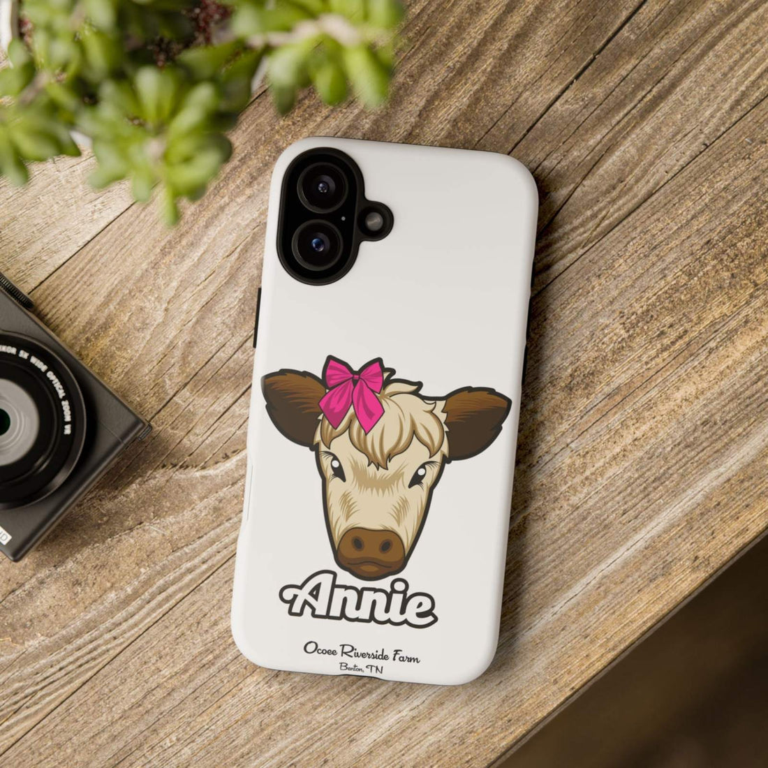 Cute Annie the Cow phone case with red bow, ideal farm animal lover gift, stylish and durable design.