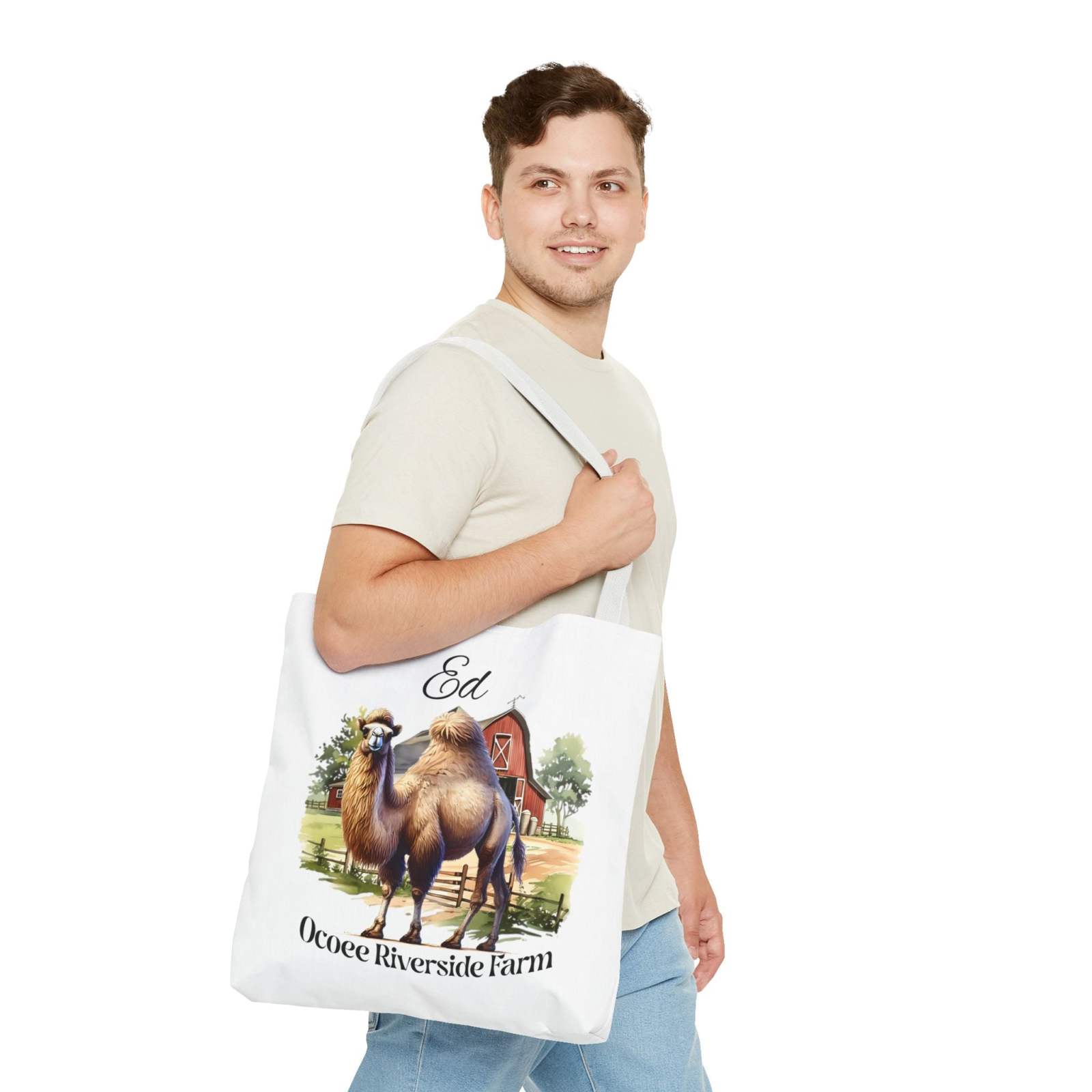 Man carrying Ed Camel Tote Bag featuring camel and farm design, eco-friendly shopping bag from Ocoee Riverside Farm