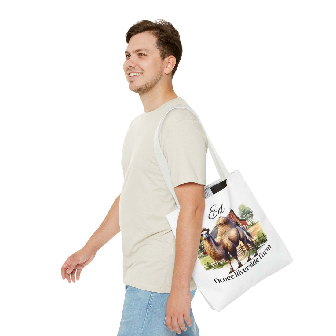 Man carrying Ed Camel Tote Bag with camel and farm design, eco-friendly shopping bag from Ocoee Riverside Farm