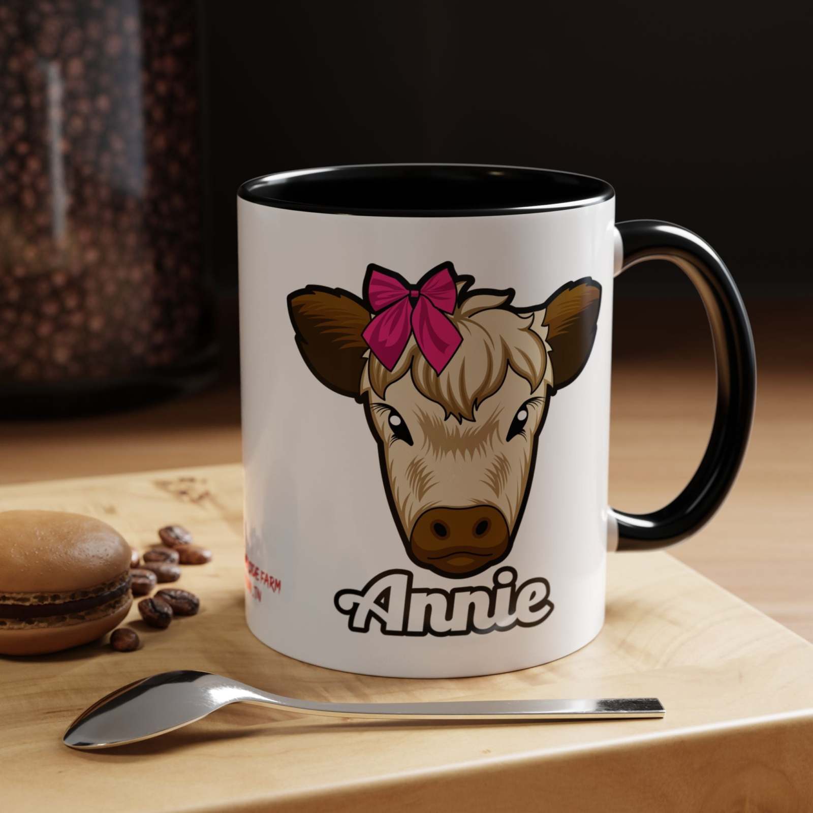Farmhouse cow coffee mug with red bow design "Annie" on ceramic, for rustic décor lovers.
