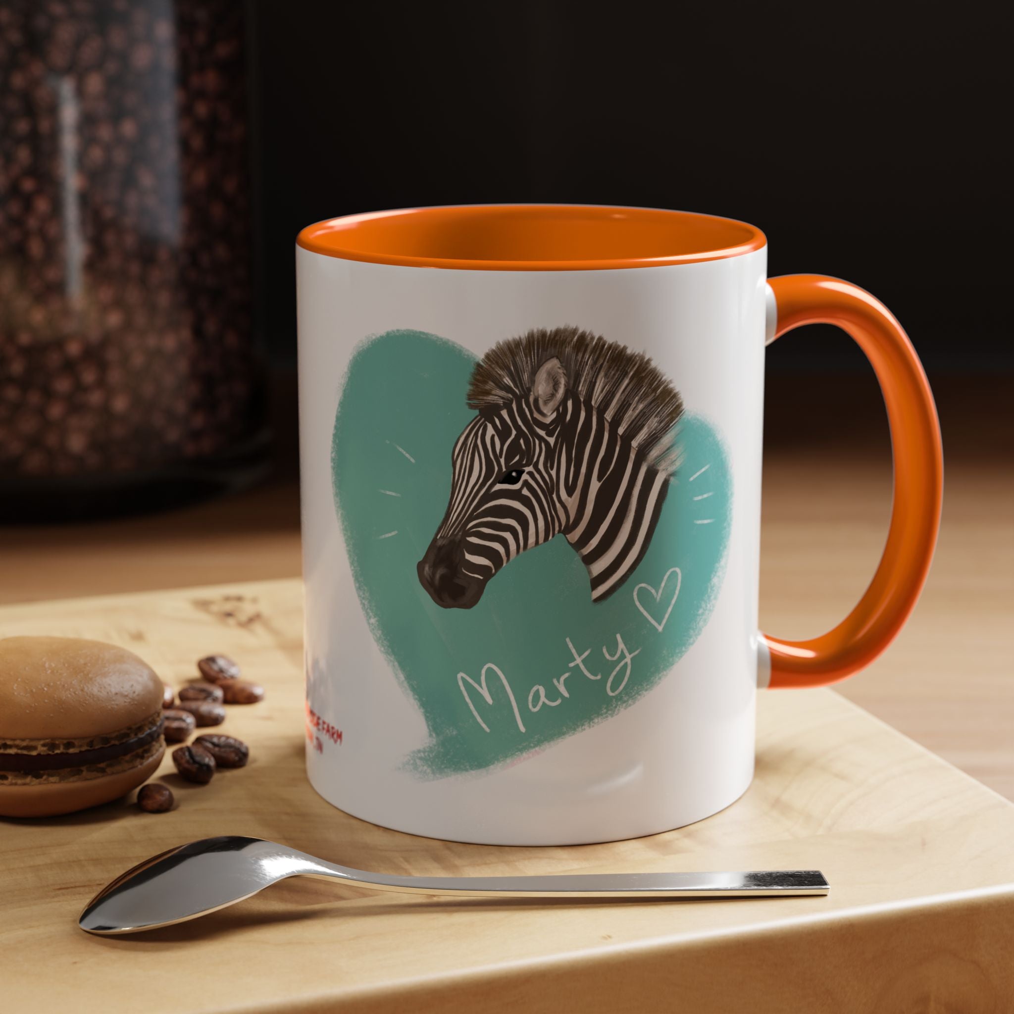 A zebra adorned with the word "Marty" creatively integrated into its stripes at Ocoee Riverside Farm Coffee Mug