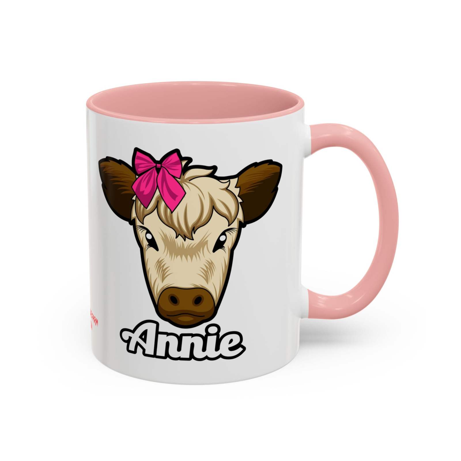 Farmhouse cow coffee mug with Annie and red bow design, pink interior and handle.