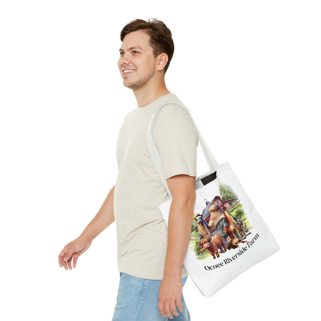 Man carrying eco-friendly Animals Tote Bag with Ocoee Riverside Farm animal design on white background