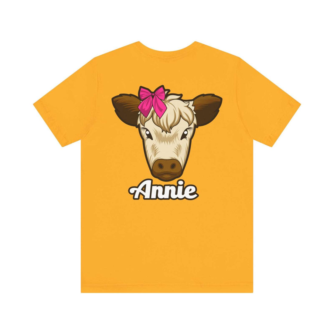 Farm Life T-Shirt featuring Annie the Cow with red bow design on a yellow background.