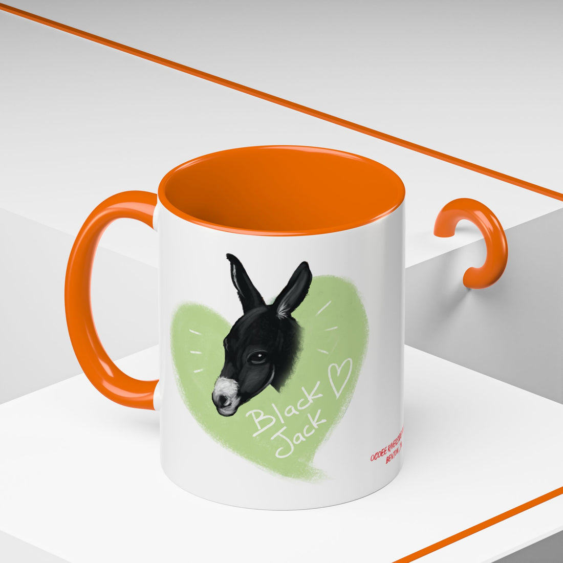 A donkey featuring the words "Black Jack" prominently displayed on its side at Ocoee Riverside Farm Coffee Mug