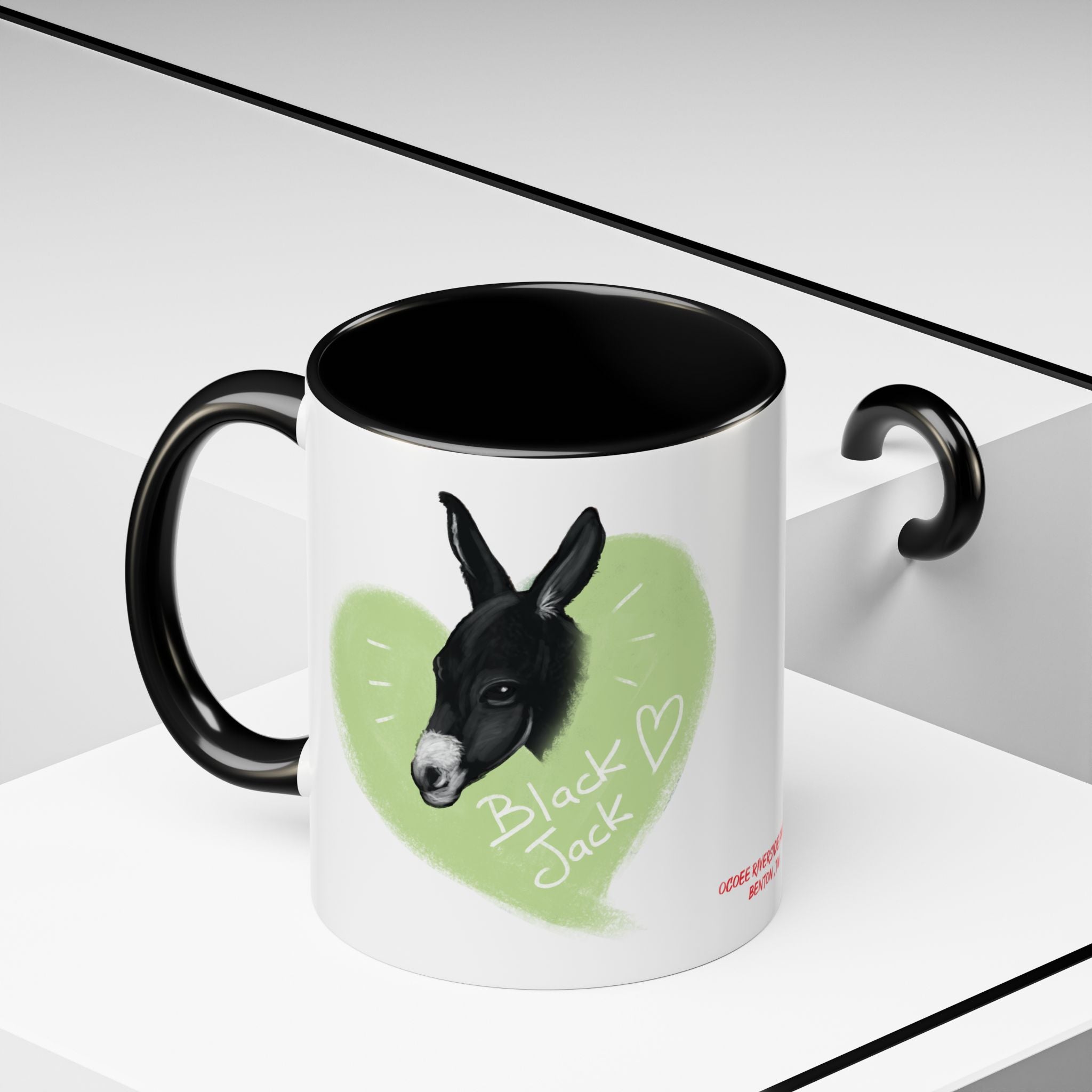 A donkey featuring the words "Black Jack" prominently displayed on its side at Ocoee Riverside Farm Coffee Mug