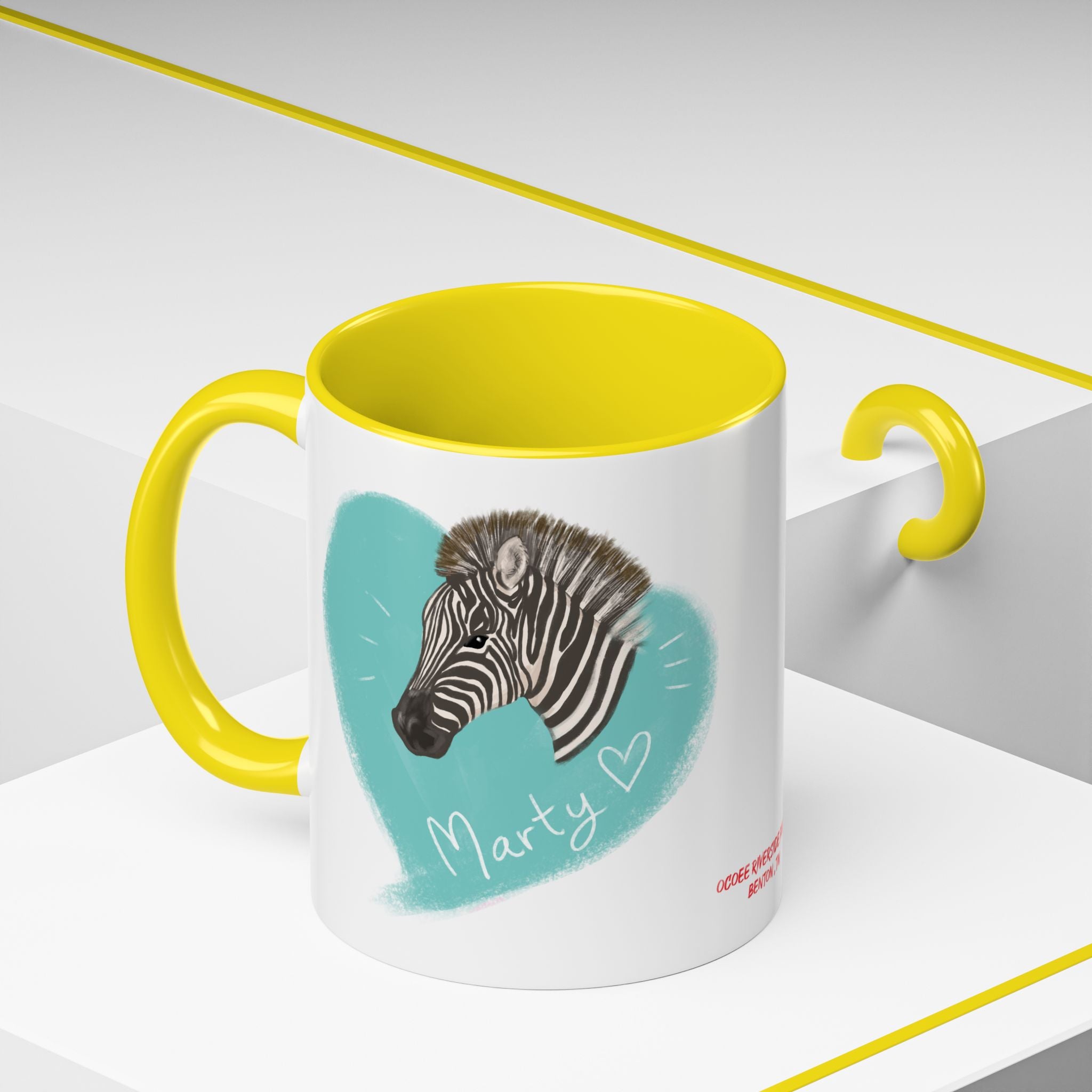A zebra adorned with the word "Marty" creatively integrated into its stripes at Ocoee Riverside Farm Coffee Mug