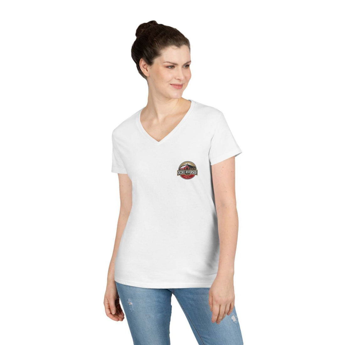 Woman wearing white Tennessee Farm Life V-Neck shirt with Spud Heart design and blue jeans