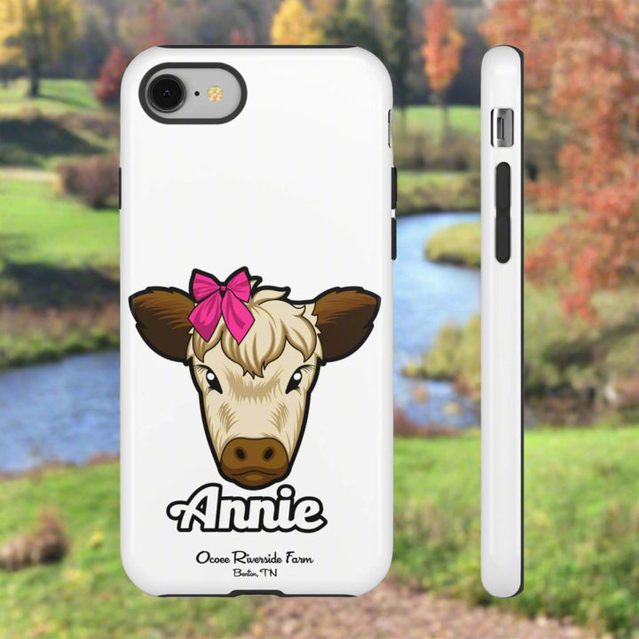 Cute cow phone case with red bow, ideal farm animal lover gift.
