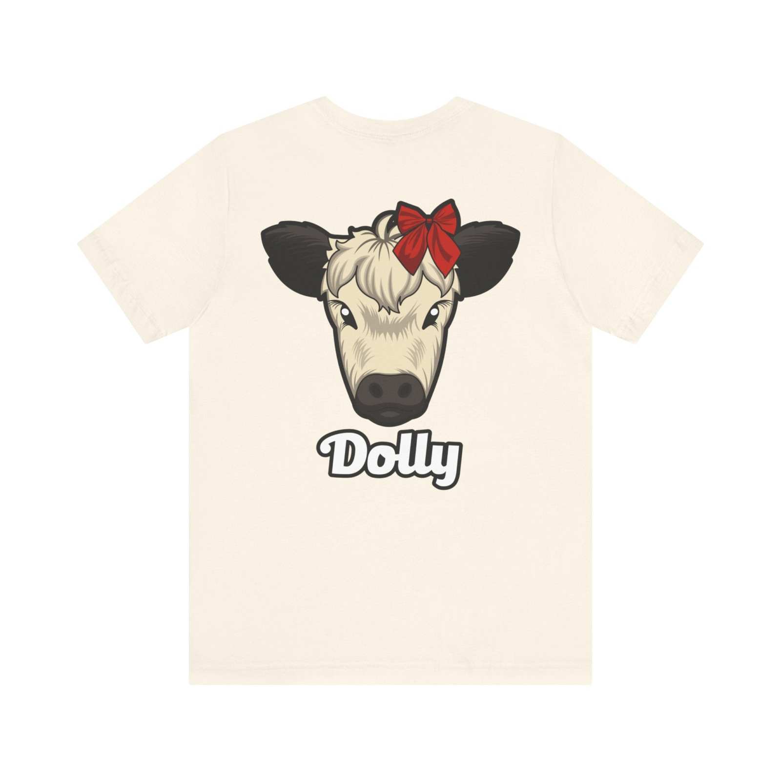 Cream Country Cow Graphic Tee with Dolly cow illustration wearing red bow and text beneath