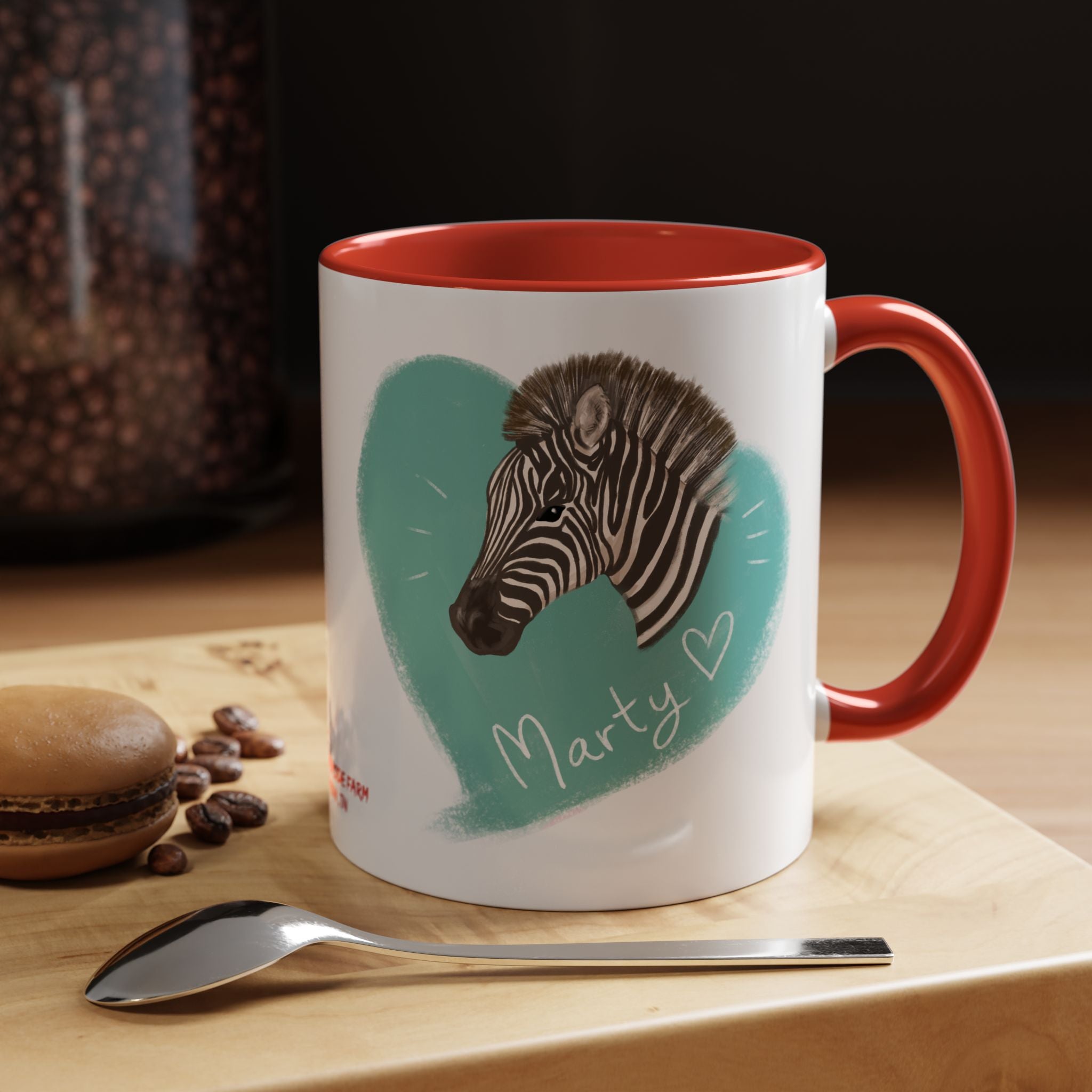 A zebra adorned with the word "Marty" creatively integrated into its stripes at Ocoee Riverside Farm Coffee Mug
