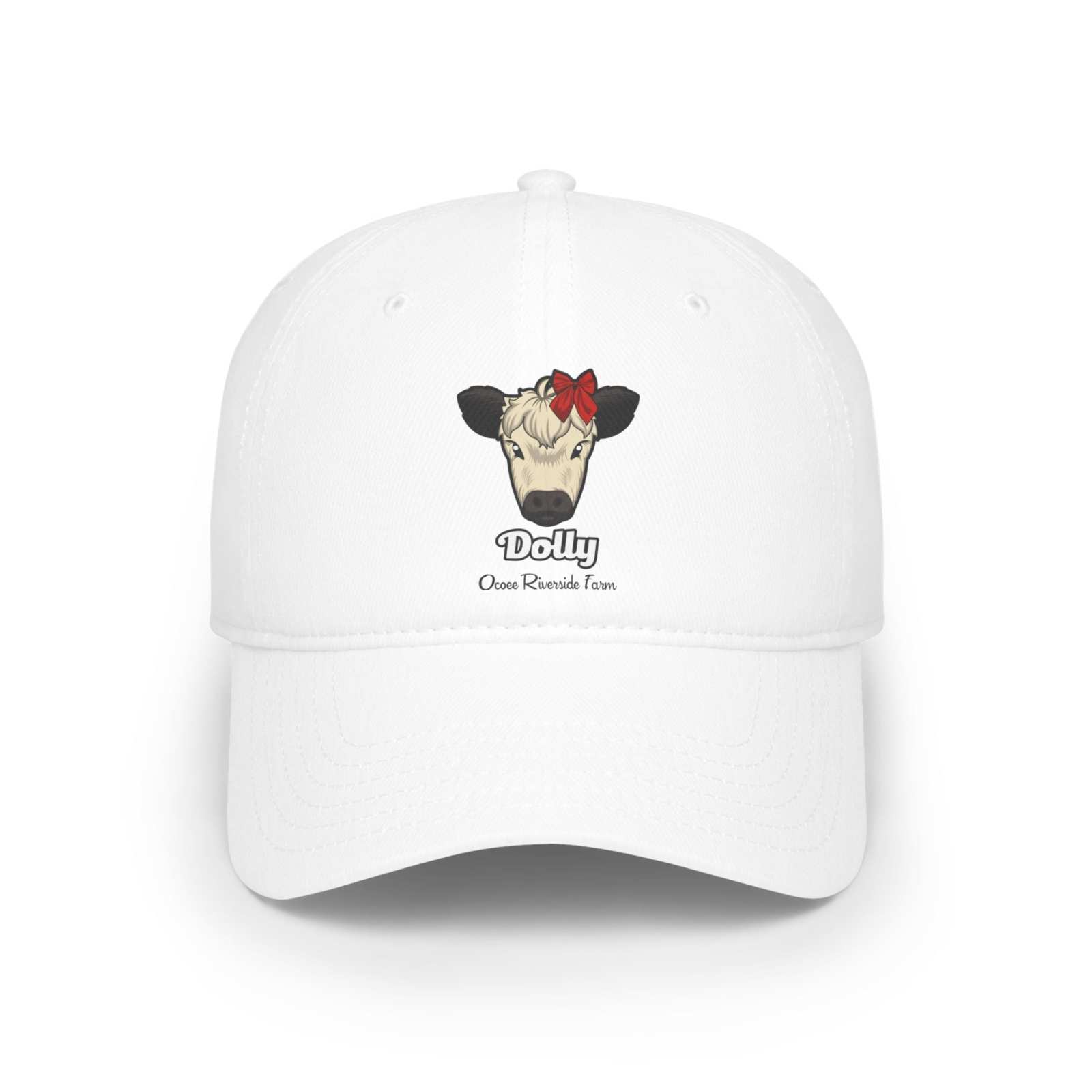 White low profile cotton baseball cap featuring a cow named Dolly with a red bow on its head and Ocoee Riverside Farm text