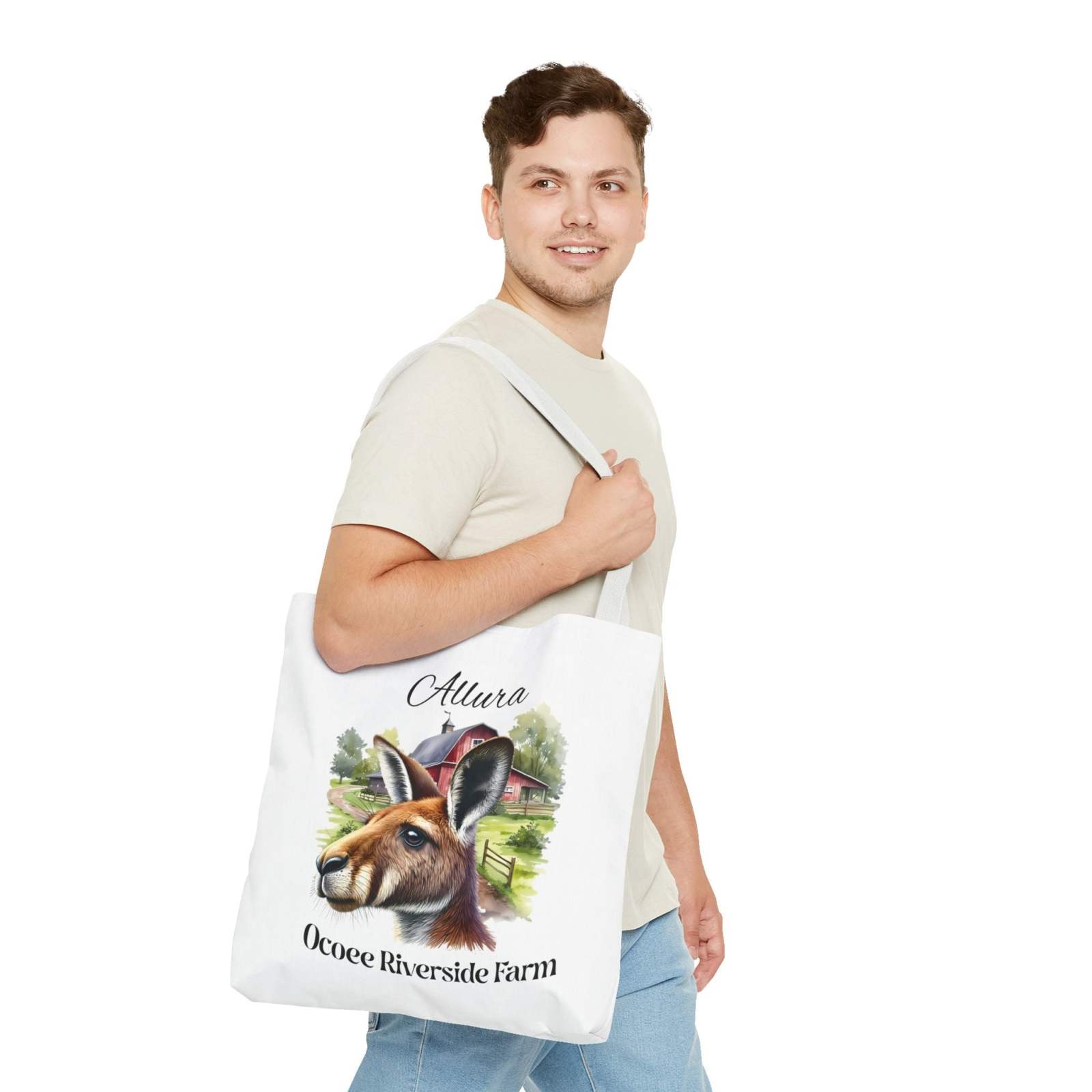 Man carrying Allura Kangaroo Tote Bag with kangaroo artwork and Ocoee Riverside Farm text