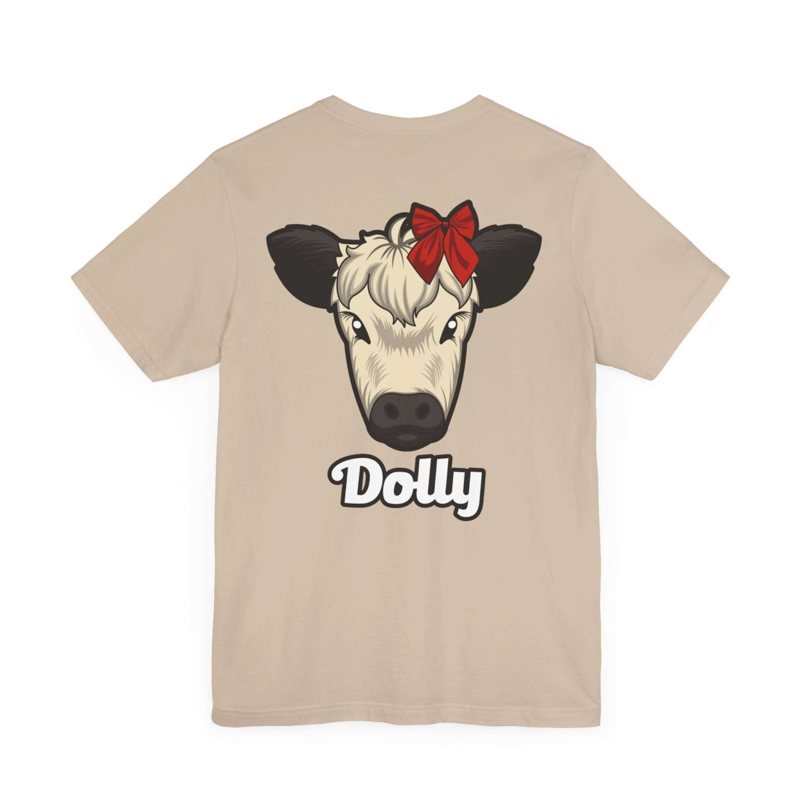 Beige Country Cow Graphic Tee featuring a cow named Dolly with a red bow and casual farmhouse style design.