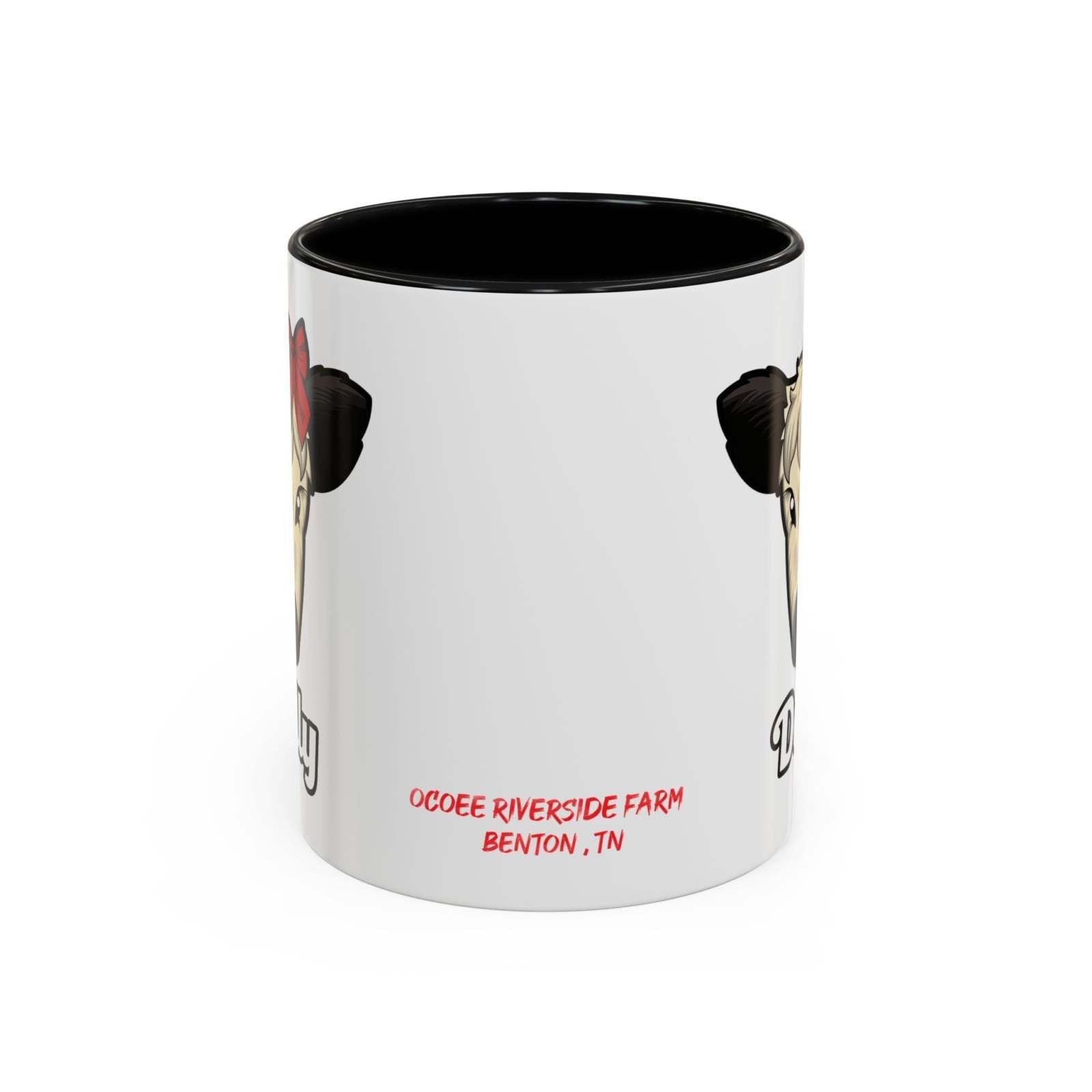 White ceramic farm animal coffee mug featuring a cute cow with a red bow and black interior, microwave and dishwasher safe.
