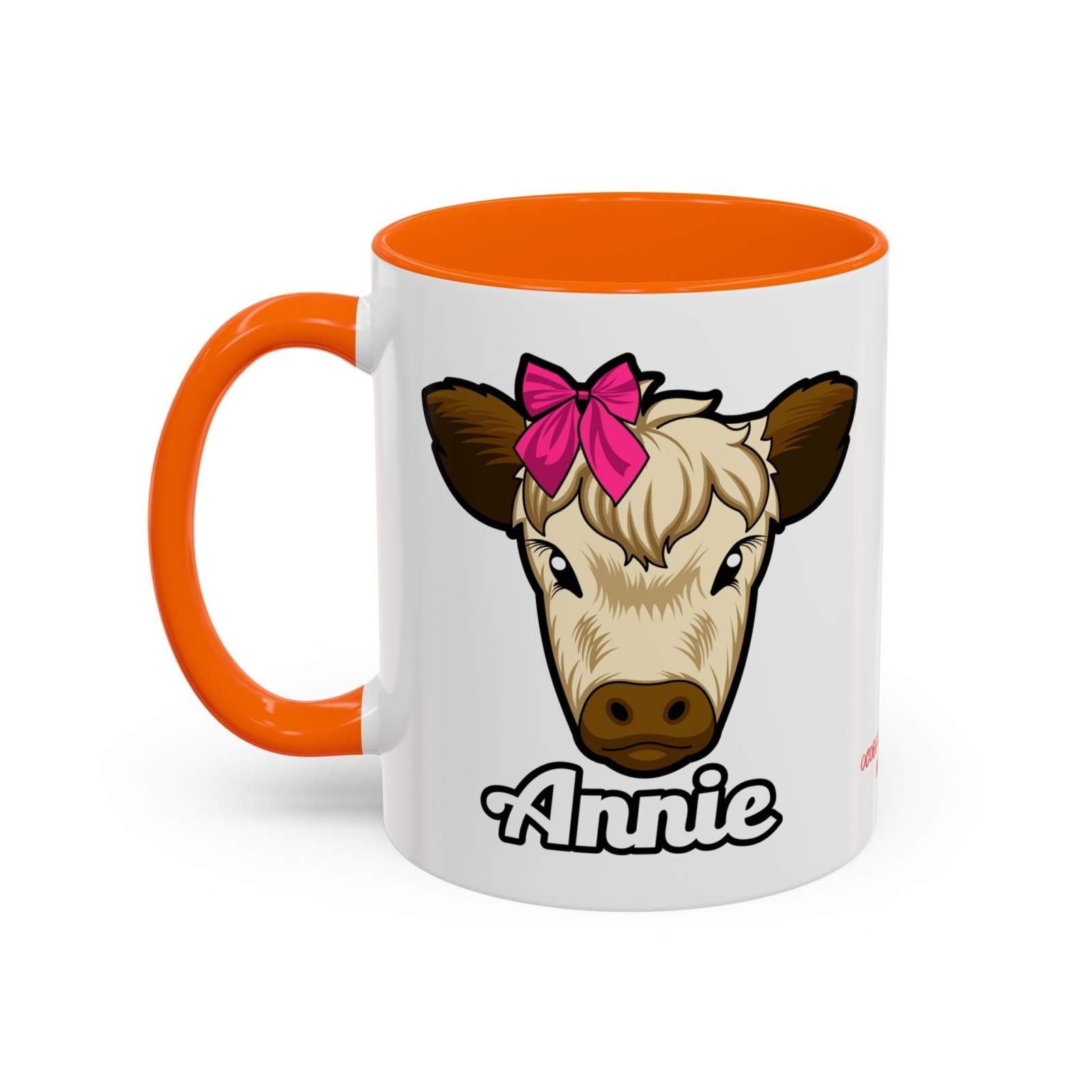 Farmhouse cow coffee mug with red bow design and orange handle.