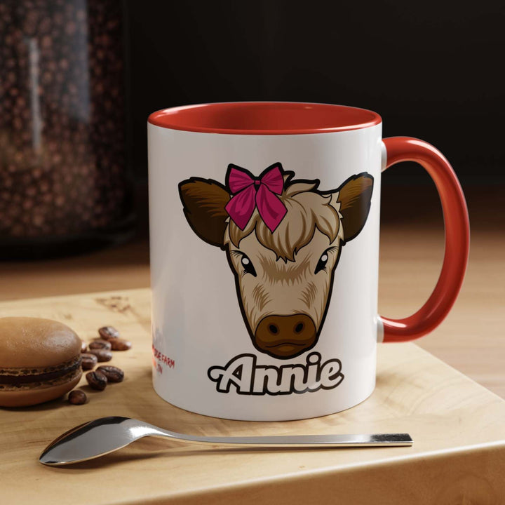 Farmhouse cow coffee mug featuring Annie with a red bow, high-quality ceramic design.