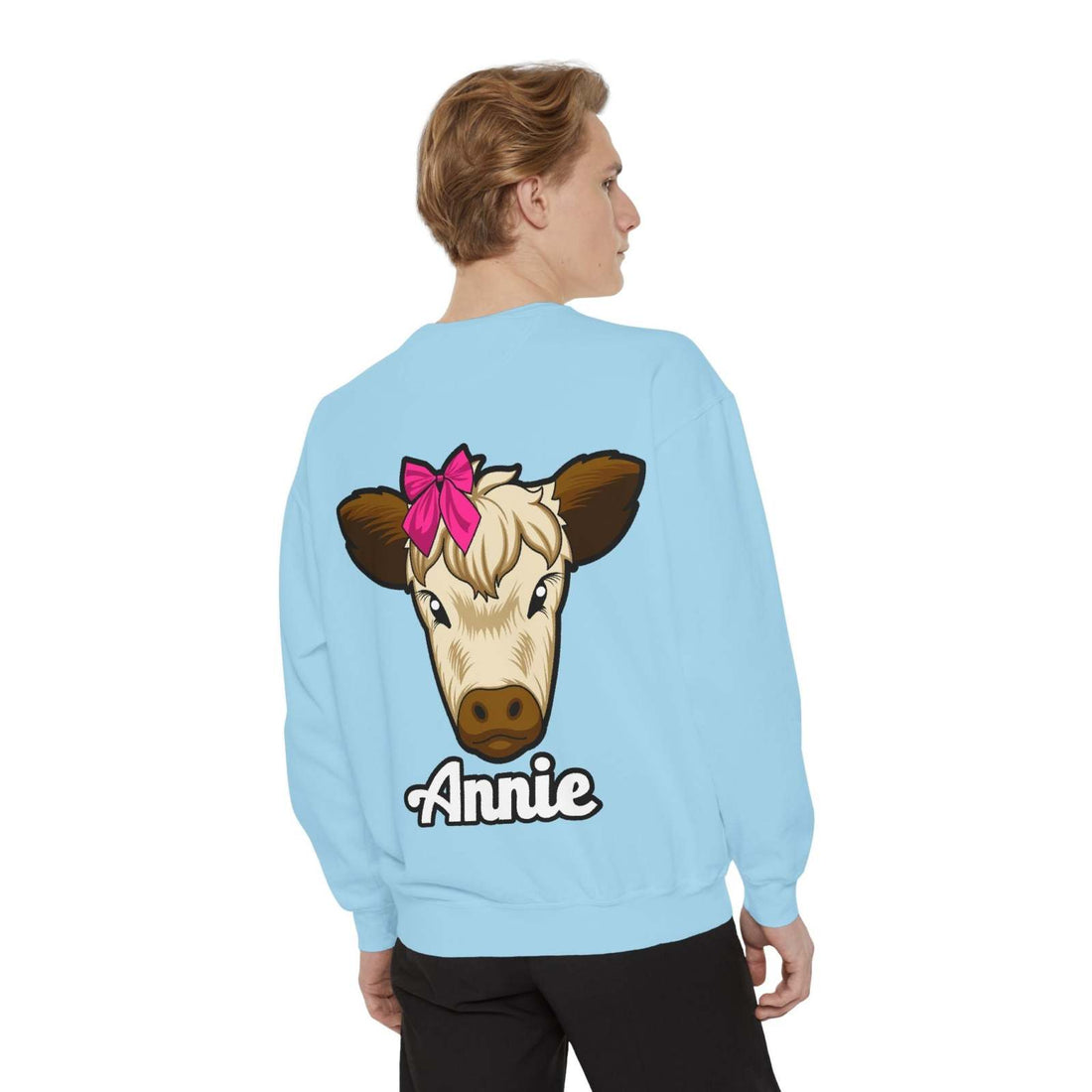 Cute farm animal sweatshirt featuring Annie the Cow with a red bow design on the back.