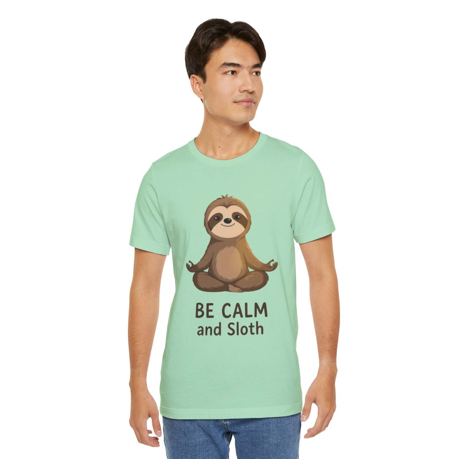 Man wearing mint green sloth t-shirt with "Be Calm and Sloth" text and meditating sloth graphic