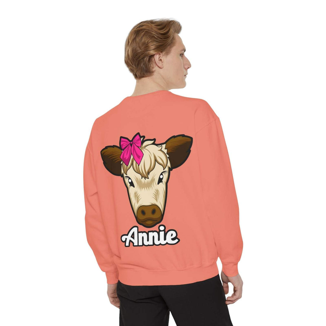 Cute farm animal sweatshirt featuring Annie the Cow with a red bow, perfect for countryside lovers.