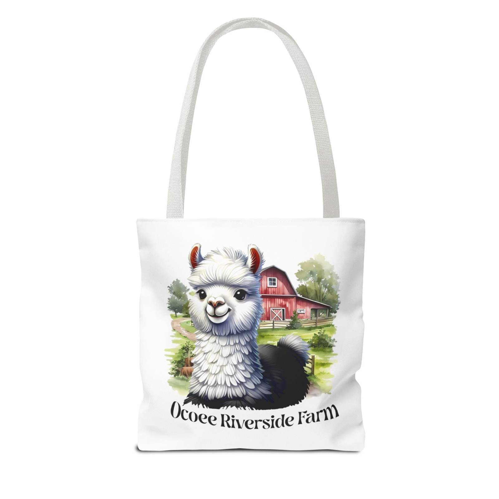 White eco-friendly Alpaca Tote Bag featuring a cute alpaca and Ocoee Riverside Farm text, with durable reinforced handles.