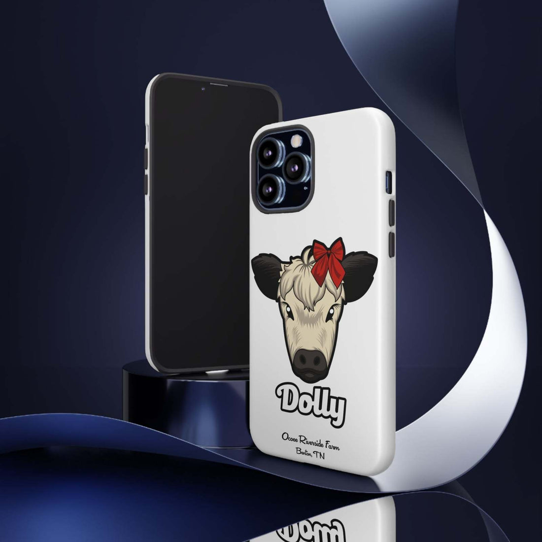 Farmhouse Chic Phone Case featuring Dolly the Cow with a red bow, offers rustic charm and protection.