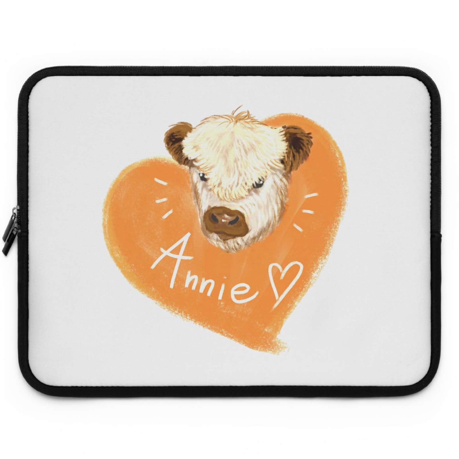 Custom Cow Laptop Sleeve featuring a cow illustration and heart design with personalized name Annie on a white background.