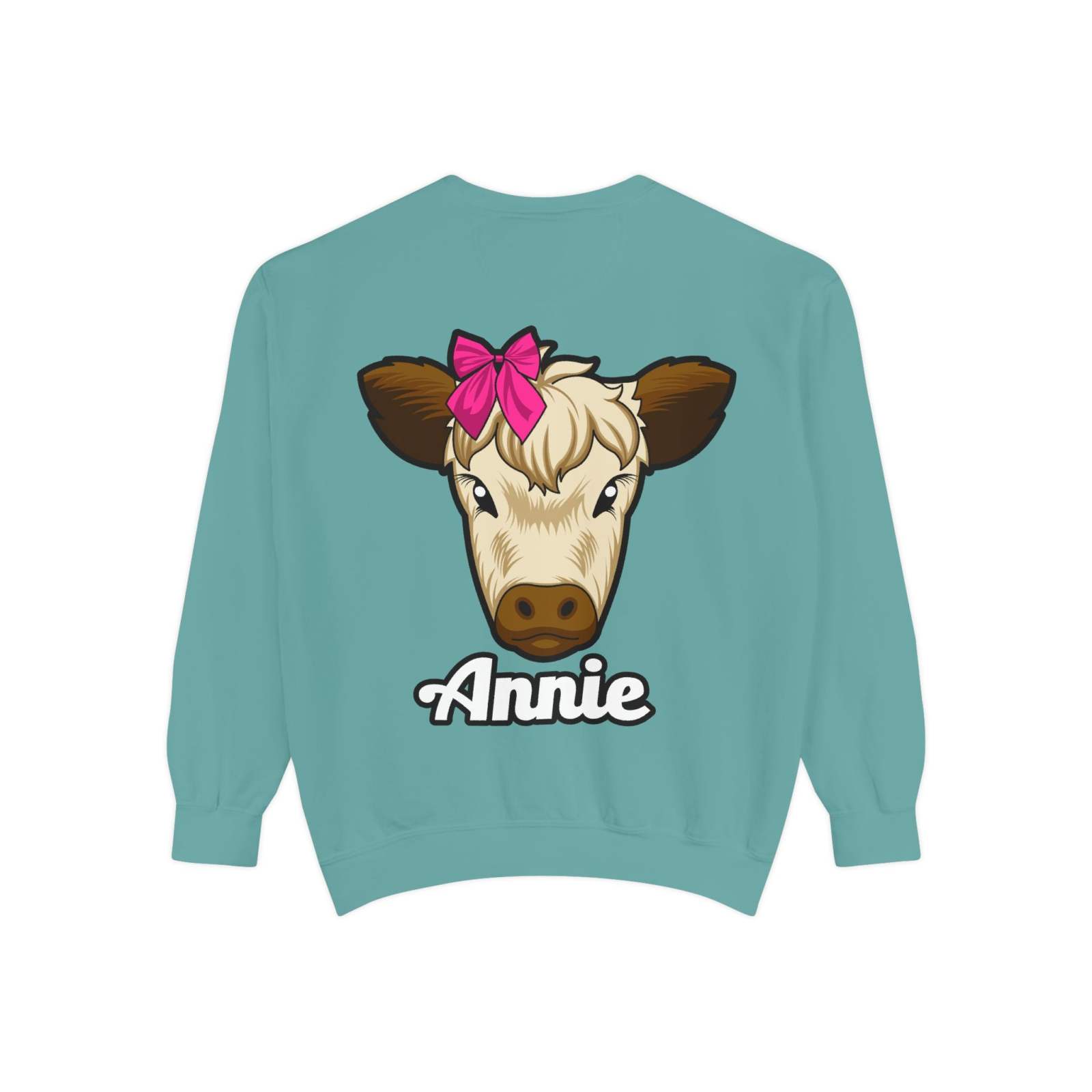 Farm animal sweatshirt featuring Annie the cow with a red bow on a teal background.