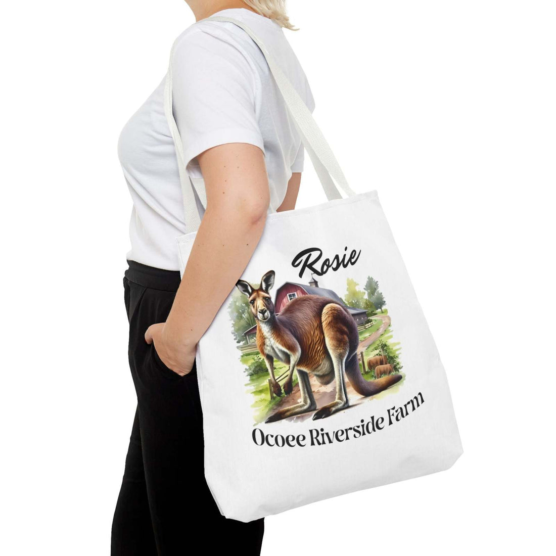 White eco-friendly Rosie Kangaroo Tote Bag from Ocoee Riverside Farm with colorful kangaroo and farm design, worn over shoulder